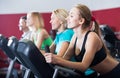 Adults in gym working out at group class Royalty Free Stock Photo