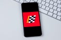 Advance Auto Parts app logo on a smartphone screen.