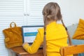 Advance learning, distance education, hobby and leisure activity concept, child girl using laptop at home Royalty Free Stock Photo