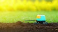 Advanced agricultural robot scanning soil quality on a farm, utilizing sensors to analyze environmental conditions for
