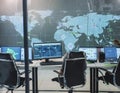 Advanced command center with holograms and world maps, concept of high-tech surveillance