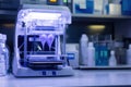 Advanced 3D bioprinter creating intricate structures in a modern laboratory setting