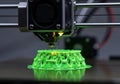 Advanced 3d printer creating complex green structure Royalty Free Stock Photo