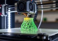 Advanced 3d printer creating complex green structure Royalty Free Stock Photo