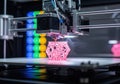 Advanced 3d printer creating a complex pink structure Royalty Free Stock Photo