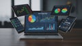 Advanced data analytics display on multiple electronic devices Royalty Free Stock Photo