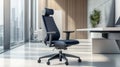 Advanced ergonomic office chair in rich midnight blue premium leather featuring intelligent support structure positioned in Royalty Free Stock Photo