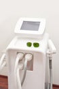 Advanced laser hair removal machine with touchscreen display and protective Royalty Free Stock Photo