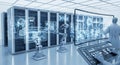 Advanced Medical Data Center with Robotic Arms and Transparent Interface in Clean Room Shows Server Racks and Human Interaction Royalty Free Stock Photo