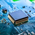Advanced Microchip on a Computer Circuit Board Royalty Free Stock Photo
