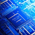Advanced Microprocessor on a Blue Circuit Board Royalty Free Stock Photo