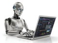 Advanced robot analyzing financial data on laptop Royalty Free Stock Photo