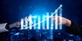 Advanced Robot Hand Reaching Out to Human Hand with Rising Graph Data on Blue Digital Background Impute Royalty Free Stock Photo