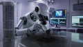 Advanced robot scientist soldering microchip in futuristic laboratory Royalty Free Stock Photo