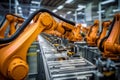 Advanced robotic arms work efficiently on an assembly line, showcasing modern manufacturing techniques in a well-lit factory