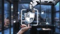 Advanced Robotic Hand Assisting Human with Cybersecurity Protection in a Modern Office Environment. Auvana Royalty Free Stock Photo