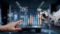 Advanced Technology in Data Analysis: Human Finger Pointing at Digital Graphs and AI Robot Hand Interacting with Royalty Free Stock Photo