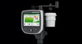 Advanced Weather Station Device with Anemometer Wind Vane Sensor and Rain Gauge on Black Background for Meteorological Royalty Free Stock Photo