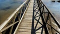 Advancing by footbridge from castle to Santa Cruz beach 11