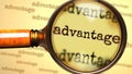 Advantage and a magnifying glass on English word Advantage to symbolize studying, examining or searching for an explanation and