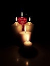 advent candle flame burns in the night Royalty Free Stock Photo