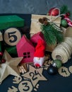 Advent calendar with gift bags and boxes filled with candy