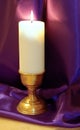 Advent candle on purple