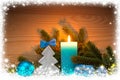 Advent candle and wood fir tree . Christmas background. Royalty Free Stock Photo