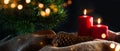 Advent candles with christmas ornaments Royalty Free Stock Photo