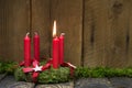 Advent or christmas wreath with four red wax candles. Royalty Free Stock Photo