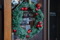 Advent Christmas wreath on front door of cafe