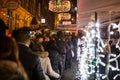 Advent and crowd of people on charismas celebration into city of Royalty Free Stock Photo