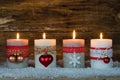 Advent decoration with four burning candles Royalty Free Stock Photo