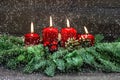 Advent decoration. Four red burning candles. Holidays background Royalty Free Stock Photo