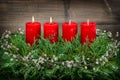 Advent decoration with red burning candles vintage style Royalty Free Stock Photo