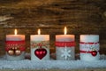 Advent decoration with three burning candles Royalty Free Stock Photo