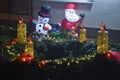 Figures snow white and santa claus and the fourth advent candle in the bistarac
