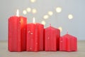 Advent. 2 lighted candles. 4 red candles. It takes an Advent Sunday. Christmas is behind the door. Photo decoration.