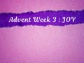 Advent week 3 joy text on purple color with pink background. Christmas preparation or Advent season concept.