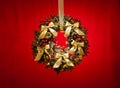 Advent wreath over red background Royalty Free Stock Photo