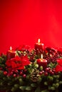 Advent wreath over red background Royalty Free Stock Photo