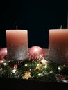 Advent wreath with pink candles and christmas bubbles