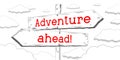 Adventure ahead - outline signpost with two arrows Royalty Free Stock Photo