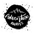 Adventure awaits hand lettering quote with mountains Royalty Free Stock Photo