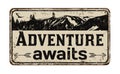 Adventure awaits vintage rusty metal sign Royalty Free Stock Photo