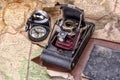 Adventure with camera, compass, map and diary for travel, exploration and discovery Royalty Free Stock Photo