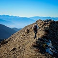 Adventure Hiker near Mountain Summit Royalty Free Stock Photo