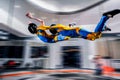 Flight. Peoples fly in wind tunnel. Indoor skydiving. Swim in wind tunnel. New sport in flight technology. Royalty Free Stock Photo