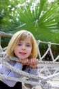 Adventure little girl on jungle park rope bridge Royalty Free Stock Photo