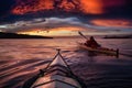 Adventure Man on a Sea Kayak at Sunset Royalty Free Stock Photo